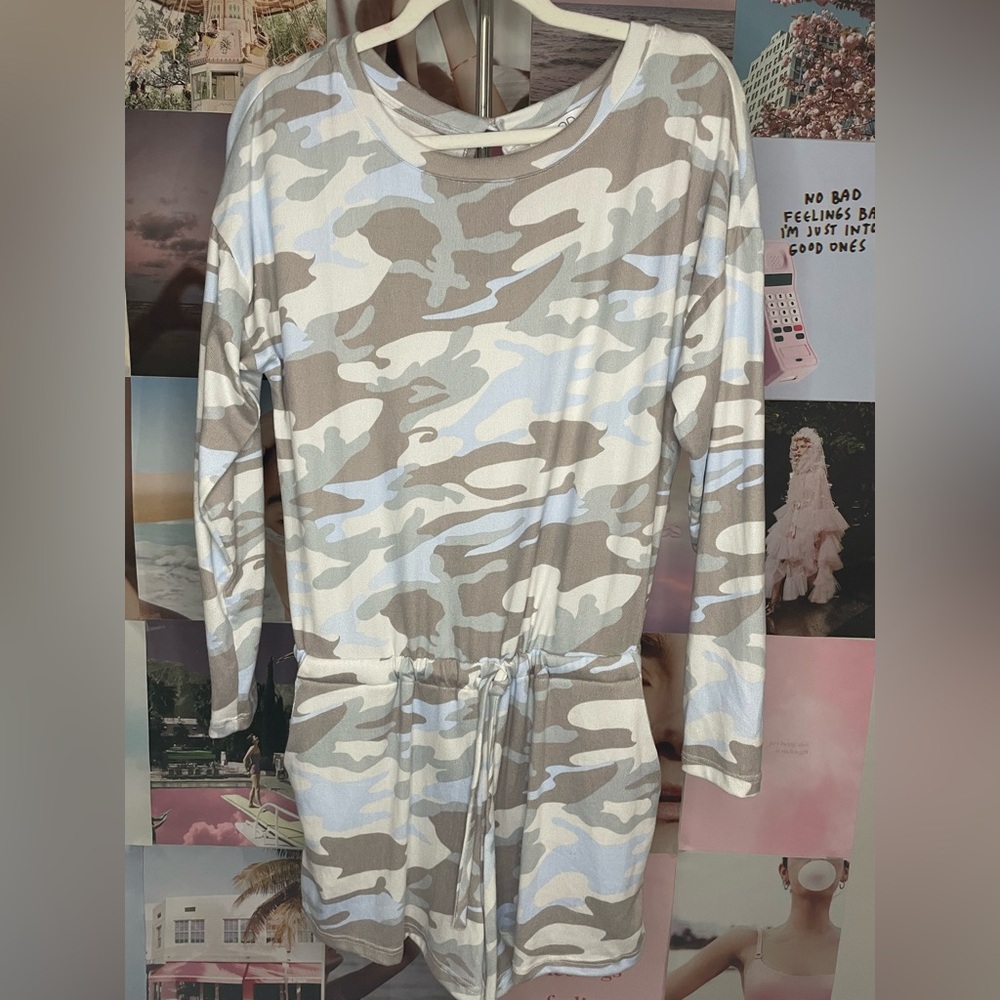 Camo romper with long sleeves and tie waist shorts. NWOT size medium